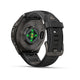 Et Garmin fenix 9 Pro InReach 43 mm AMOLED-smartur i Carbon Grey DLC-titanium med sort rem vises set bagfra, hvor man kan se de grønne sensorlamper og en opladningsport. Urets elegante sorte rem har en sikker lås og flere justeringshuller, hvilket er et eksempel på Garmins avancerede teknologi – ideelt til eventyrere, der ønsker banebrydende InReach-satellitforbindelse.