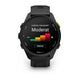 En Garmin Forerunner 70 i sort viser et dansk søjlediagram mærket "Moderat", beder om valg af intensitetsniveau og har en grøn "Næste"-knap nedenunder til pulsmåling.