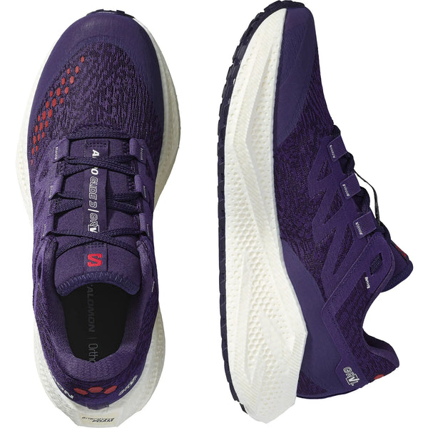 To billeder af Salomon Aero Glide 3 GRVL løbesko, Dame, i Astral Aura/Vanilla Ice/Haute Red med hvid tekstureret sål, Matryx-overdel, mesh-overdel og mærket tekst på pløsen. Perfekt til løb på grus, vist fra oven og fra siden.