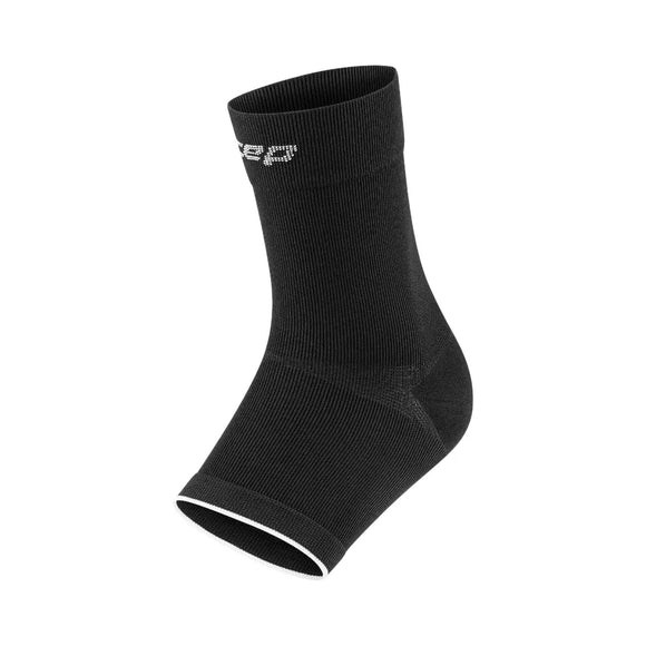 CEP Mid Support Ankle Sleeve 2.0, Unisex, i sort/grå, har et hvidt logo i toppen og en hvid stribe omkring tåen for fast kompressionsstøtte, vist mod en almindelig hvid baggrund.