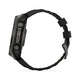 Sidebillede af et Garmin Fenix 8 Solar Sapphire Titanium 51 mm i Carbon Grey med Pebble Grey-silikonearmbånd og to sideknapper, fotograferet mod en hvid baggrund.