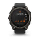 Et Garmin Fenix 8 Solar Sapphire Titanium 51 mm i Carbon Grey/Pebble Grey viser en skærm med en graf over de sidste 4 timers lyseksponering i orange, der viser 65,1K Lx HRS og en lodret skala fra 0 til 70K.