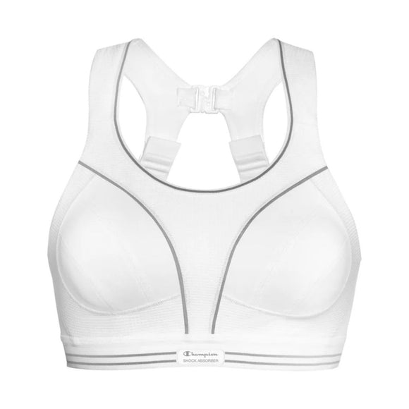 Shock Absorber Ultimate Run Bra Padded til kvinder i hvid har en racerback, sømme foran og en lås bagpå. Båndet foran viser mærkenavn og produkttekst for stil og maksimal støtte.
