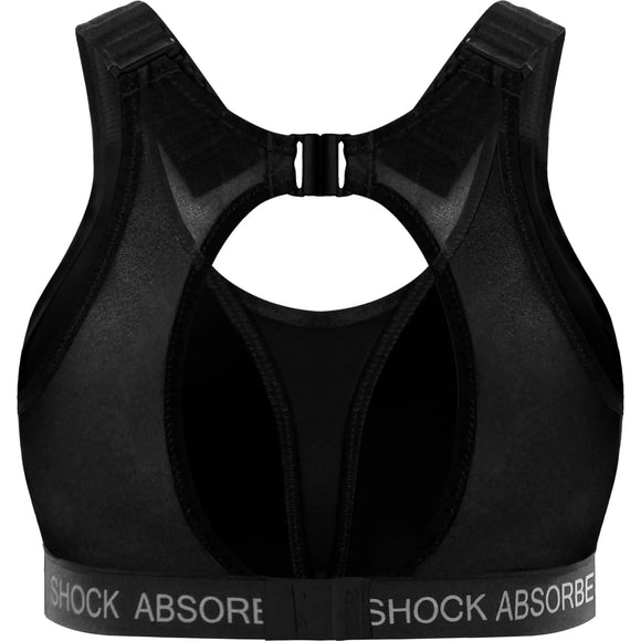 Shock Absorber Ultimate Run Bra Padded v1 til kvinder i sort er vist bagfra med en racerback-udskæring og justerbar hægte. "SHOCK ABSORBER" er trykt i hvidt på det nederste bånd for en stilfuld finish.