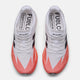 New Balance Fuelcell Supercomp Elite V5 Herre løbesko i Urgent Red set ovenfra, med hvid overdel, sorte sidestriber og fed "FuelCell SuperComp"-skrift på indersålerne.