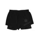 De sorte Saysky Pace 2in1 Shorts 3" til kvinder har elastisk linning, stjernegrafik og SAYSKY-logo på venstre ben - ideelle til trailløb. Vist fladt på en hvid baggrund.